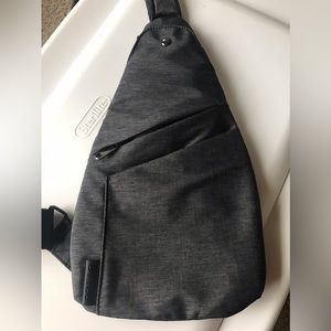 Cross body front pack travel bag